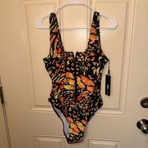 Fashion Nova Black and Orange Patterned Swimsuit